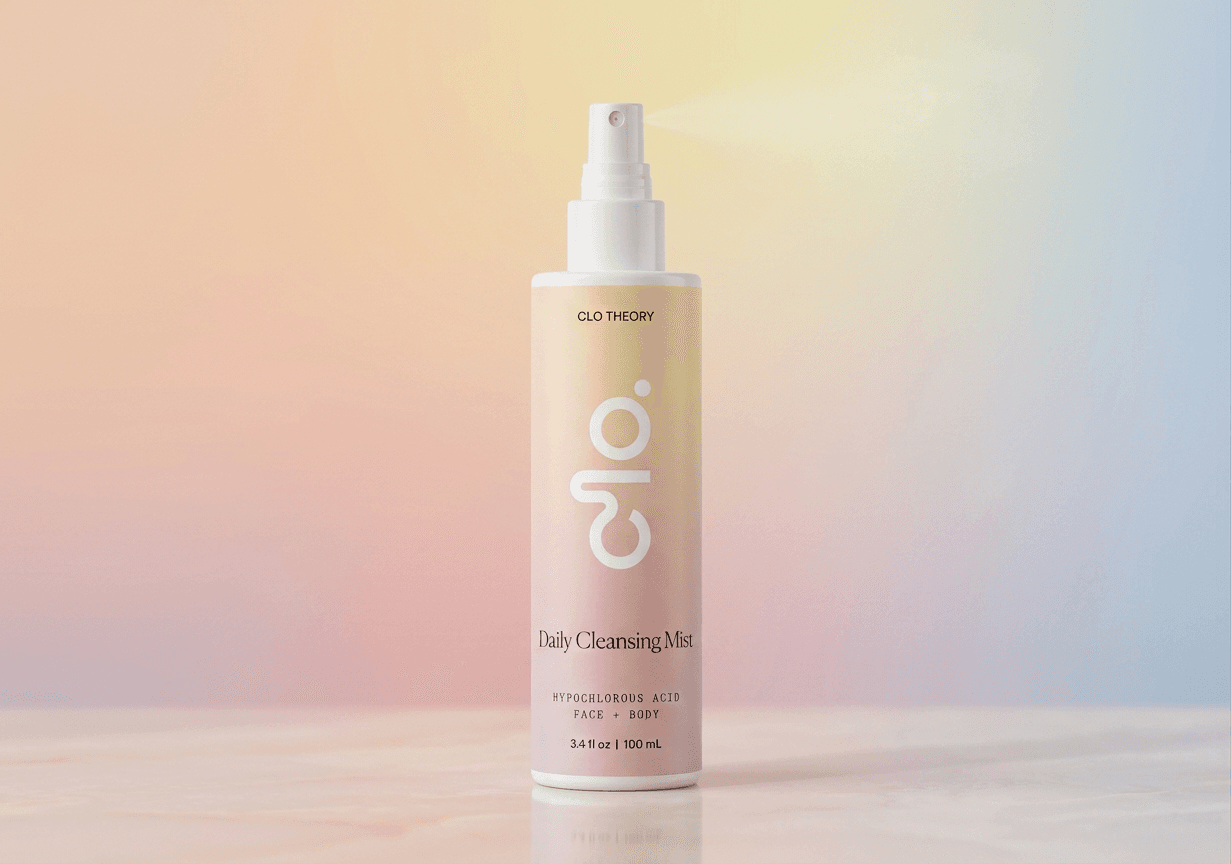 Clo Daily Cleansing Mist bottle against a soft pastel backdrop